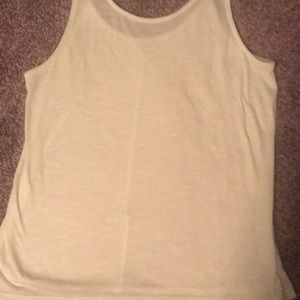 A youth large tank top that is yellow